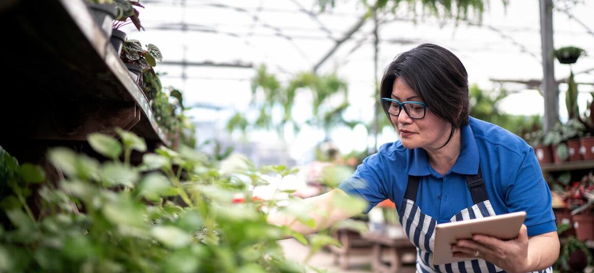 Woman in greenhouse